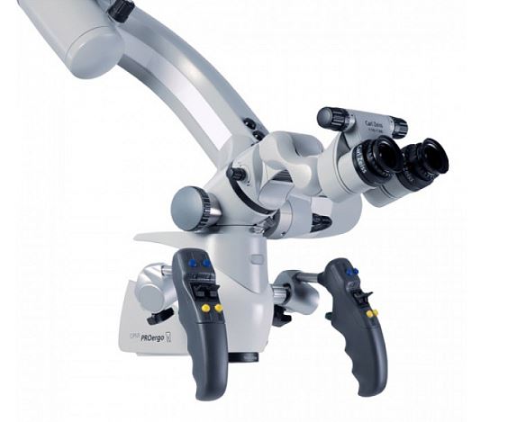 An image of a grayish white surgical operating microscope.